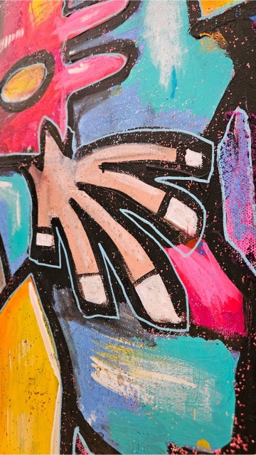 Foto av deler av maleriet til salgs med fargerik kunst detaljer. 